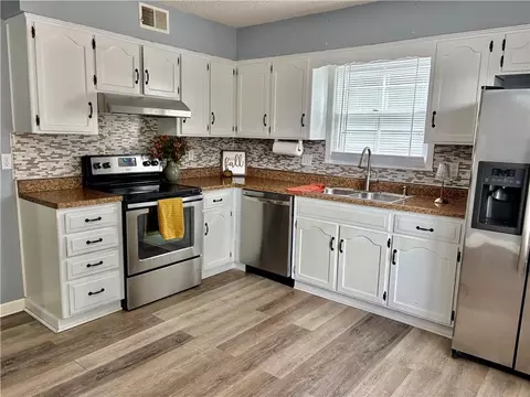 Kitchen - 1704 Cinnabar Dr, Raymore, MO 64083 photo 5 of 5