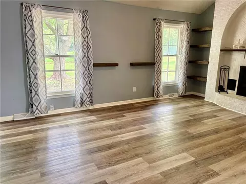 Living - 1704 Cinnabar Dr, Raymore, MO 64083 photo 2 of 2