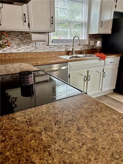 Kitchen - 1704 Cinnabar Dr, Raymore, MO 64083 photo 2 of 5