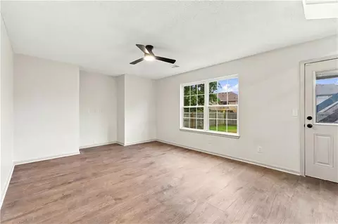 Living - 718 Shiloh Dr, Raymore, MO 64083 photo 5 of 7