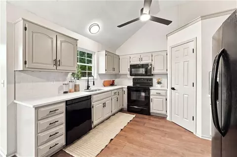 Kitchen - 718 Shiloh Dr, Raymore, MO 64083 photo 2 of 5