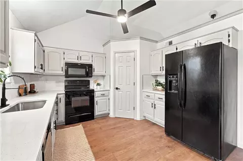 Kitchen - 718 Shiloh Dr, Raymore, MO 64083 photo 3 of 5