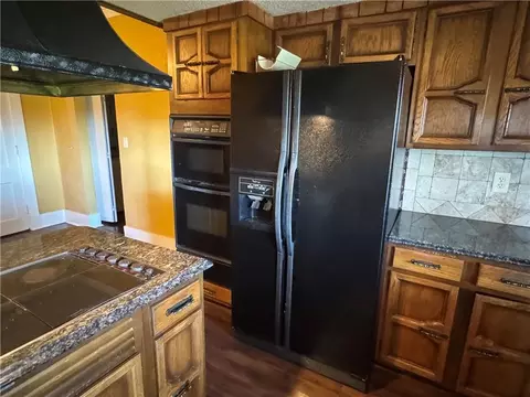 Kitchen - 14361 Zane Ave, Kidder, MO 64649 photo 5 of 6