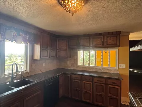 Kitchen - 14361 Zane Ave, Kidder, MO 64649 photo 6 of 6