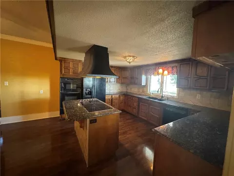 Kitchen - 14361 Zane Ave, Kidder, MO 64649 photo 2 of 6