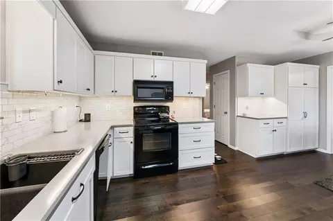 Kitchen - 809 NE Aaron Dr, Lees Summit, MO 64086 photo 3 of 5