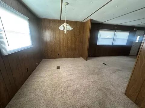 Living - 411 W Pine St, Orrick, MO 64077 photo 4 of 6