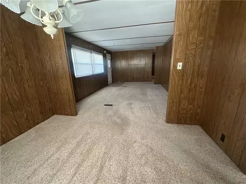 Living - 411 W Pine St, Orrick, MO 64077 photo 3 of 6