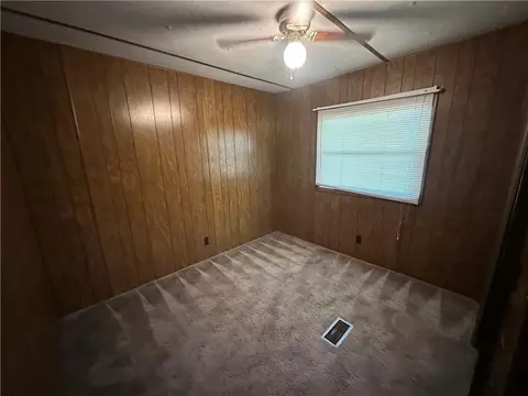 Bedroom - 411 W Pine St, Orrick, MO 64077 photo 1 of 4