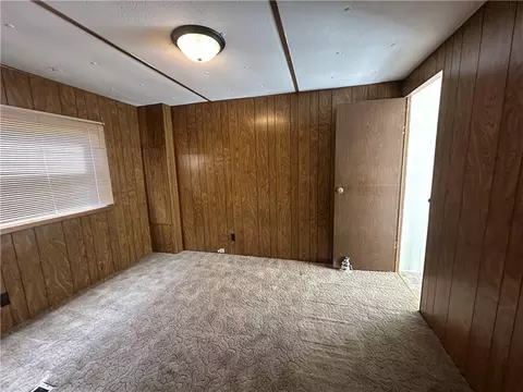 Bedroom - 411 W Pine St, Orrick, MO 64077 photo 3 of 4