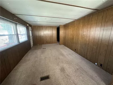 Living - 411 W Pine St, Orrick, MO 64077 photo 1 of 6
