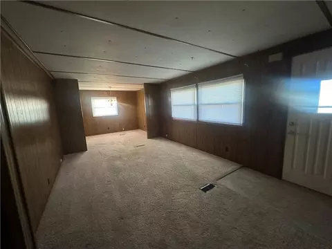 Living - 411 W Pine St, Orrick, MO 64077 photo 2 of 6