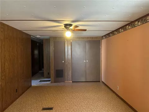 Living - 411 W Pine St, Orrick, MO 64077 photo 6 of 6