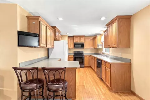 Kitchen - 363 E Lowell St, Claycomo, MO 64119 photo 2 of 5