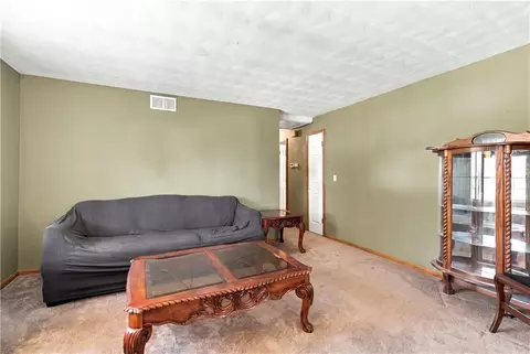 Living - 363 E Lowell St, Claycomo, MO 64119 photo 2 of 3