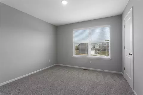 Bedroom - 523 Lemon Mint Dr, Raymore, MO 64083 photo 5 of 7