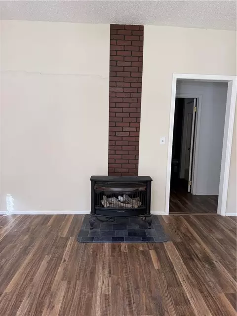 Living - 301 E 6th St, Caney, KS 67333 photo 2 of 3