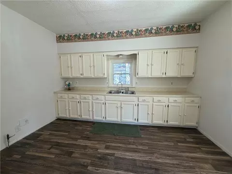 Kitchen - 301 E 6th St, Caney, KS 67333 photo 1 of 2