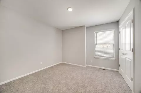 Bedroom - 512 Foxglove Ln, Raymore, MO 64083 photo 5 of 10