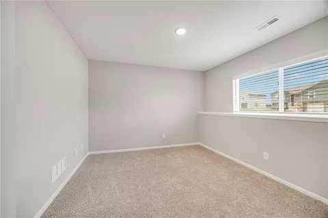 Bedroom - 512 Foxglove Ln, Raymore, MO 64083 photo 9 of 10