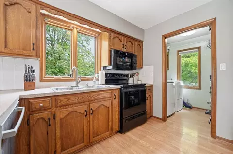 Kitchen - 702 Raven St, Raymore, MO 64083 photo 2 of 3