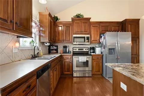 Kitchen - 1900 Sequoia Dr, Raymore, MO 64083 photo 2 of 3