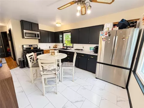 Kitchen - 116 S Elm St, Stanberry, MO 64489 photo 1 of 2