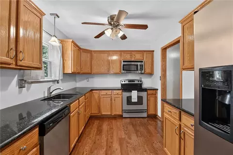 Kitchen - 787 E State Route J Hwy, Peculiar, MO 64078 photo 1 of 3