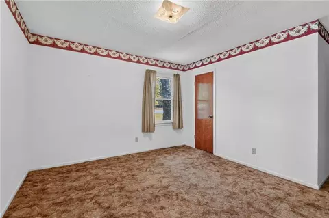 Bedroom - 787 E State Route J Hwy, Peculiar, MO 64078 photo 4 of 6