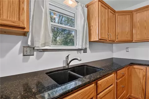 Kitchen - 787 E State Route J Hwy, Peculiar, MO 64078 photo 2 of 3