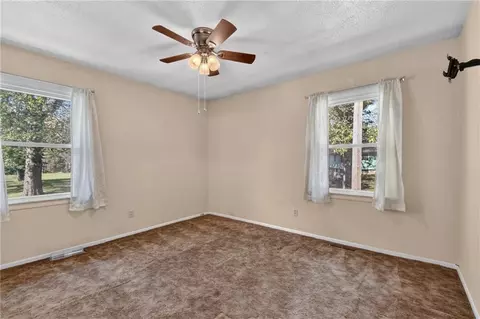 Bedroom - 787 E State Route J Hwy, Peculiar, MO 64078 photo 5 of 6