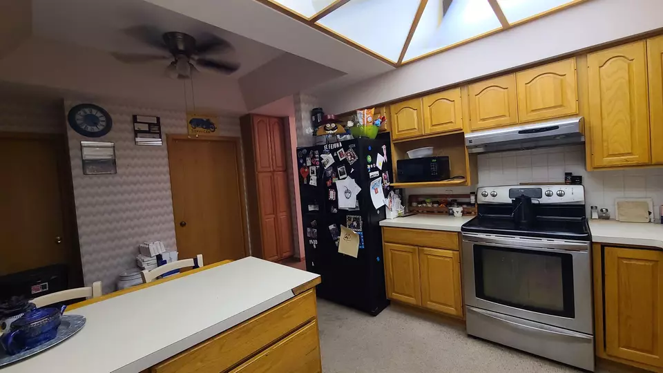 Kitchen - 610 N Washington Ave, Wellington, KS 67152 photo 3 of 3