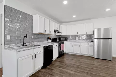 Kitchen - 317 E 6th St, Halstead, KS 67056 photo 2 of 3