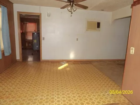 Living - 215 S Garfield Ave, Lyons, KS 67554 photo 2 of 3