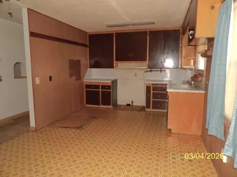 Kitchen - 215 S Garfield Ave, Lyons, KS 67554 photo 2 of 2