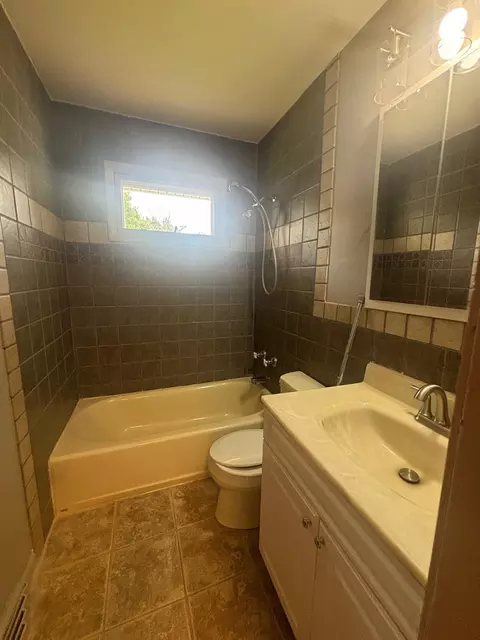 Bath - 120 E 9th, Halstead, KS 67056 photo 1 of 5