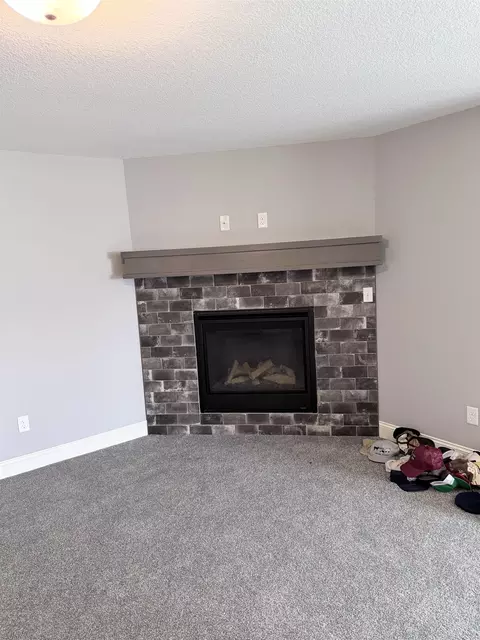Living - 404 E Samantha Ct, Mulvane, KS 67110 photo 3 of 5