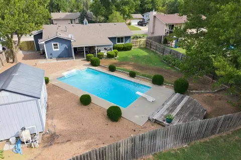 Exterior - 513 E Burning Tree Rd, Derby, KS 67037 photo 4 of 11