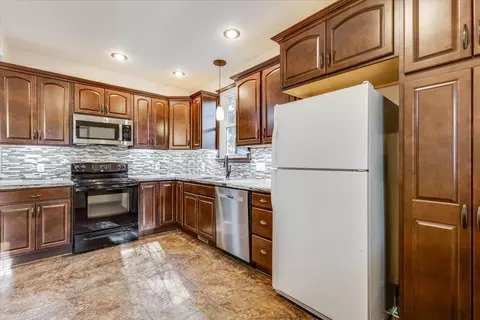 Kitchen - 720 E 8th Ave, Winfield, KS 67156 photo 2 of 4