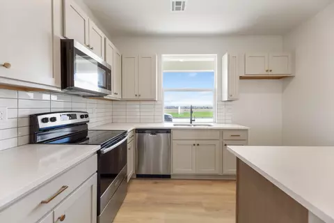 Kitchen - 12004 W Arvada Blvd, Maize, KS 67101 photo 3 of 3