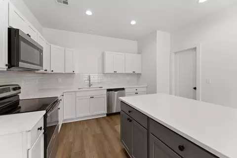 Kitchen - 12063 W Arvada Blvd, Maize, KS 67101 photo 2 of 3