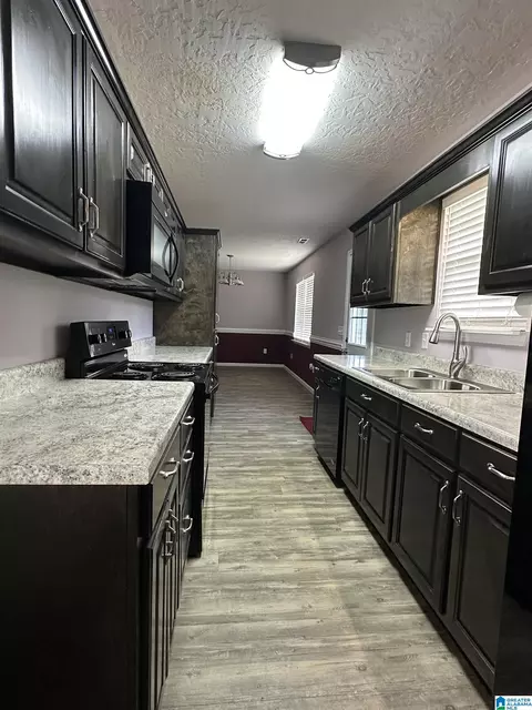 Kitchen - 426 Bailey Rd, Weaver, AL 36277 photo 3 of 3
