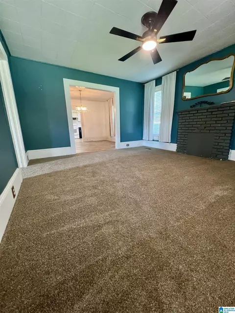 Living - 703 Hand St, Clanton, AL 35045 photo 1 of 2