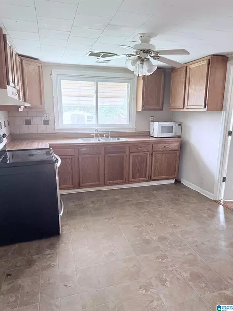 Kitchen - 5519 Powers Rd, Mount Olive, AL 35117 photo 2 of 2