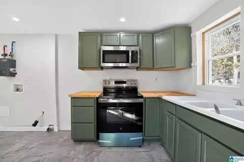 Kitchen - 306 7th St E, Warrior, AL 35180 photo 2 of 3