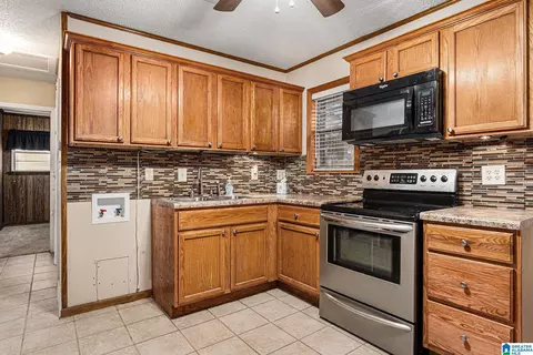 Kitchen - 108 Morris Ave, Clanton, AL 35045 photo 1 of 2