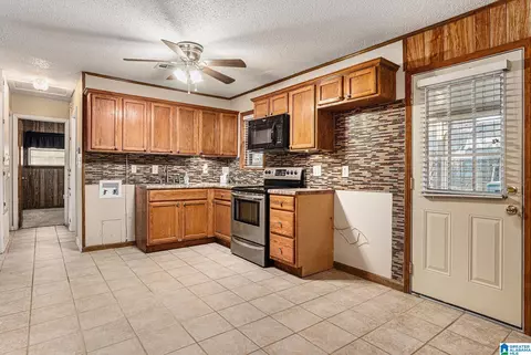 Kitchen - 108 Morris Ave, Clanton, AL 35045 photo 2 of 2
