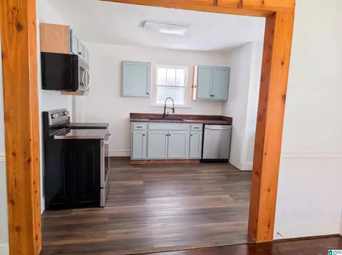 Kitchen - 1401 E 9th St, Anniston, AL 36207 photo 2 of 2