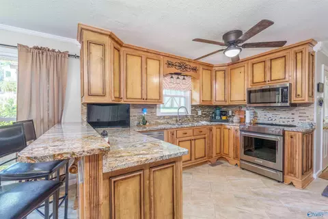 Kitchen - 203 Cedar Ln, Killen, AL 35645 photo 2 of 3