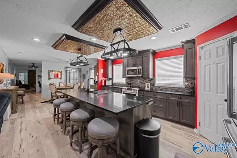 Kitchen - 606 Red Eagle Rd, Ohatchee, AL 36271 photo 2 of 4
